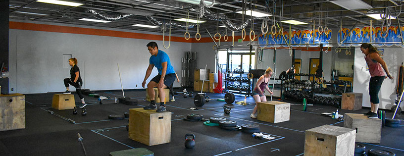 CrossFit class performs box jumps at CrossFit Alaska.