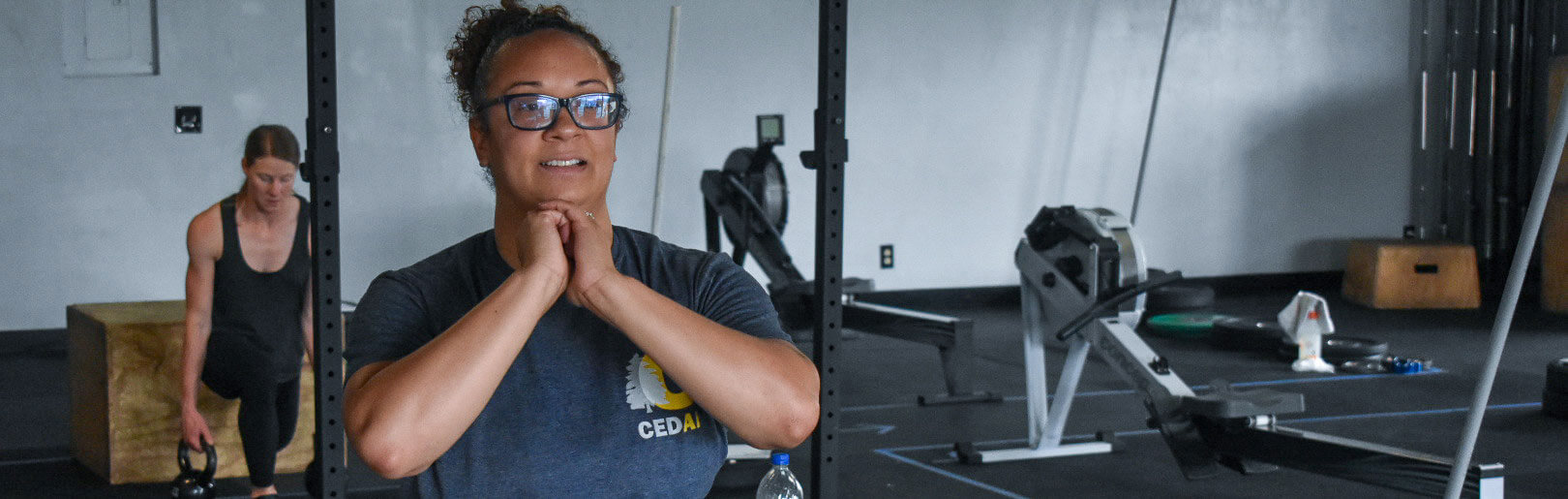 Two female members work out at CrossFit Alaska.