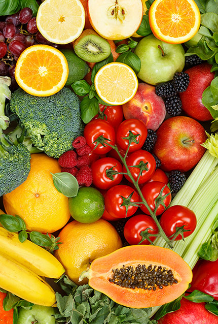 Colorful array of fruits and veggies recommended with nutritional coaching at CrossFit Alaska.